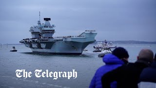 video: Queen welcomes home Royal Navy flagship after longest deployment since WW2