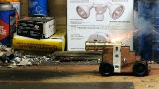 50 Caliber Brass Black Powder Cannon Firing a Heavy Powder Load
