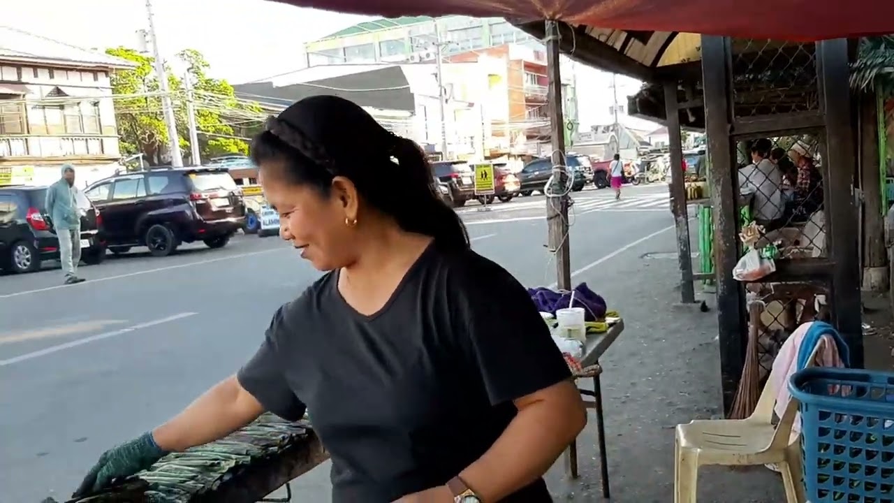 Buying Tupig beside Bolinao Church in Bolinao, Pangasinan.