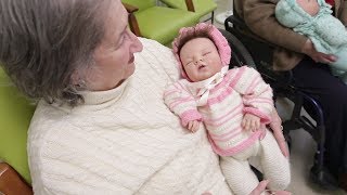 AS Hyper-realistic babies as alternative therapy for elderly people with Alzheimer’s disease