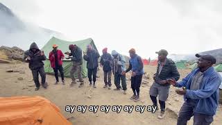 The Heartbeat of Kilimanjaro: The Porter &amp; Guide Celebration 🏔️✨