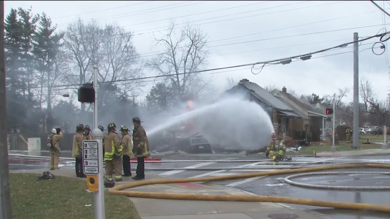 Two injured after car crashes into house, bursts into flames