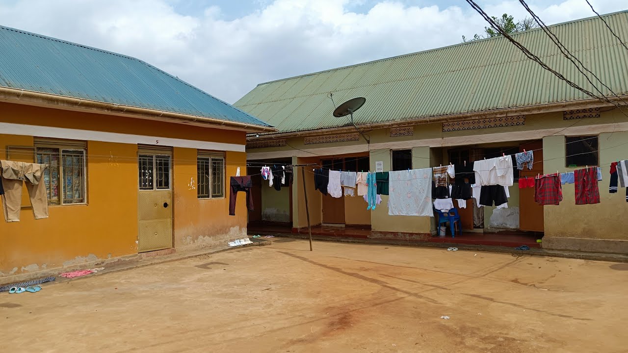 SEVEN DOUBLE ROOMS AND SIX SINGLE ROOMS RENTALS ON SALE WITH LAND TITLE ON TABLE HERE IN WAKISO 