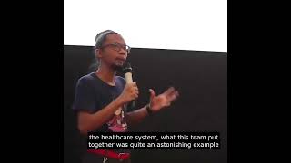 with a mic for WA Health Hackathon 2023 finale pitch