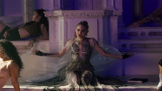 Grimes Ready For Fashionable Battle In Glossy Violence Video