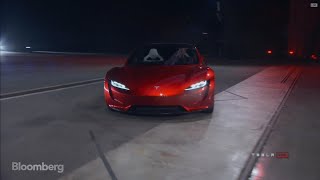 Tesla ceo elon musk surprised fans unveiling a new roadster sports car
at the company's design studio. says will go from 0-60 miles per
hou...