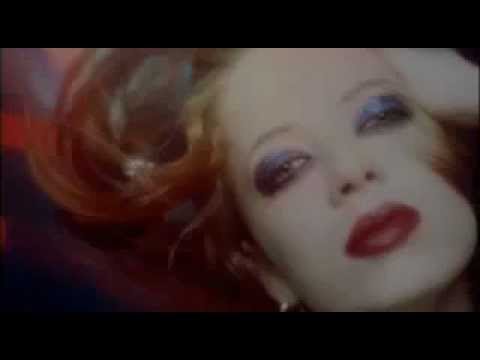 cool and atmospheric. my favourite slowy from garbage, one of my favourite bands ever. The 90s was a great decade to be a teenager when the music was waaaayyy better than today, this song, video and band being living proof of that. The song though has this huge amount of sadness to it, it hurts.... The ABSOLUTE GARBAGE (2007) DVD that contains 18 of the band's videos (including this one) plus a one hour and 9 minute documentary on the history of Garbage and the making of the 'Tell me where it hurts' video---for the European version only---is out now. I am milk I am red hot kitchen And I am cool Cool as the deep blue ocean I am lost So I am cruel But I'd be love and sweetness If I had you I'm waiting I'm waiting for you I'm waiting I'm waiting for you I am weak But I am strong I can use my tears to Bring you home I'm waiting I'm waiting for you I'm waiting I'm waiting for you I'm waiting I'm waiting for you I am milk I am red hot kitchen And I am cool Cool as the deep blue ocean I'm waiting I'm waiting for you I'm waiting I'm waiting for you I'm waiting I'm waiting for you I'm aching I'm aching for you I'm waiting I'm waiting I'm waiting for you. directed by: Stephane Sednaoui --this has been my very first youtube video that I've uploaded and I'm very proud of it--- thanx 4 watching
