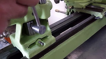 Craftsman 109 mini metal lathe with a tailstock modified to use a cam lock.