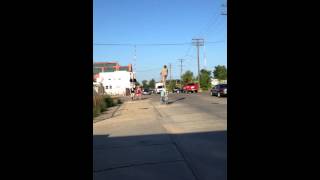 Guy riding around a really tall bike with speakers in Detroit