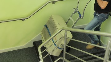 Use a Stanley Stairclimber to move heavy heating and air conditioning equipment