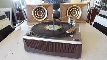 Voice of Music automatic record changer playing a LP 33.3 RPM record