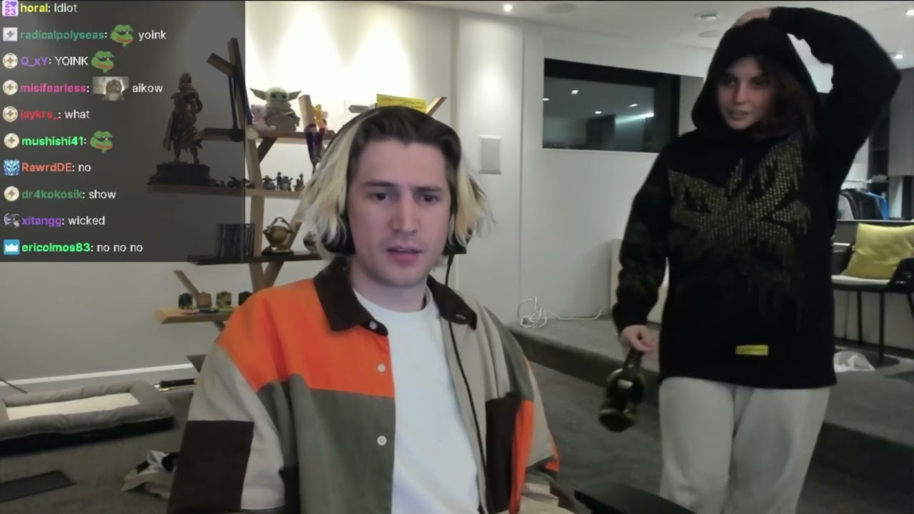 xQc is in a good mood.. and shows AikoBliss wears his upcoming Merch and ask for Chat's opinions