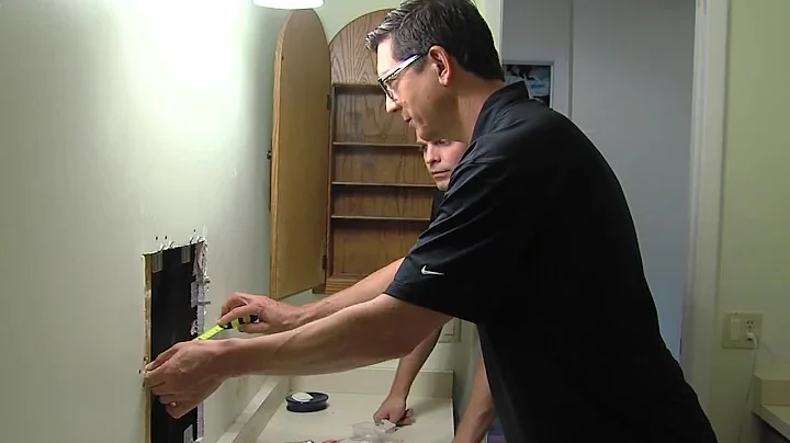 Repairing a hole in drywall: House Calls with Jame...