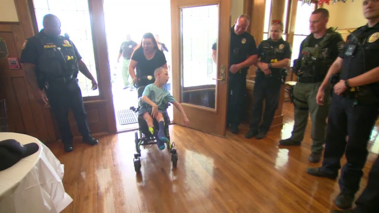 Georgia officers go all-out for special needs boy - YouTube