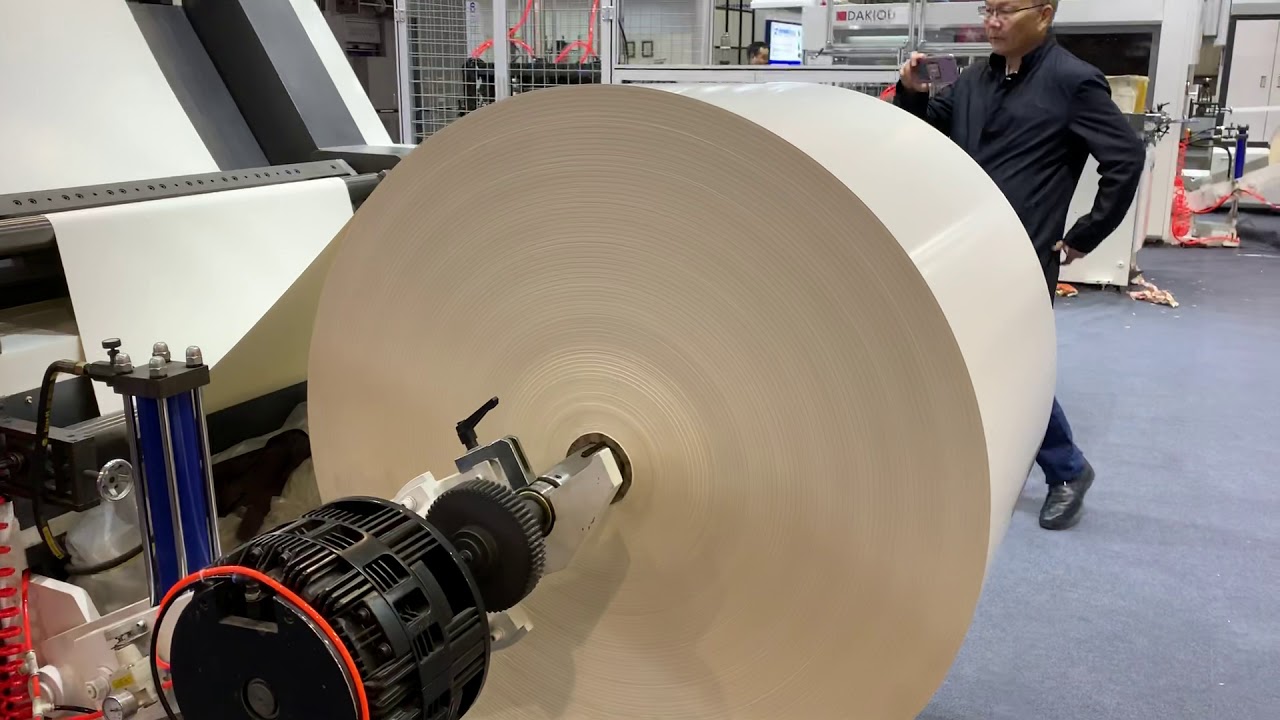Dakiou Roll paper punching cutting machine for paper cup fans with ...