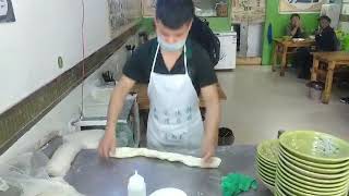 Halal Food Shop in China: Making Famous Delicious Lanzhou La Mian Noodles.