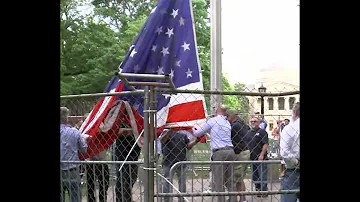 American flag at UNC replaced after protesters take down