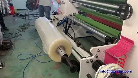 Automatic tape jumbo roll loading device
