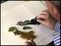 Terry Harrison painting rocks in watercolour