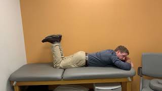 Prone hip isometric rotation followed by active IR