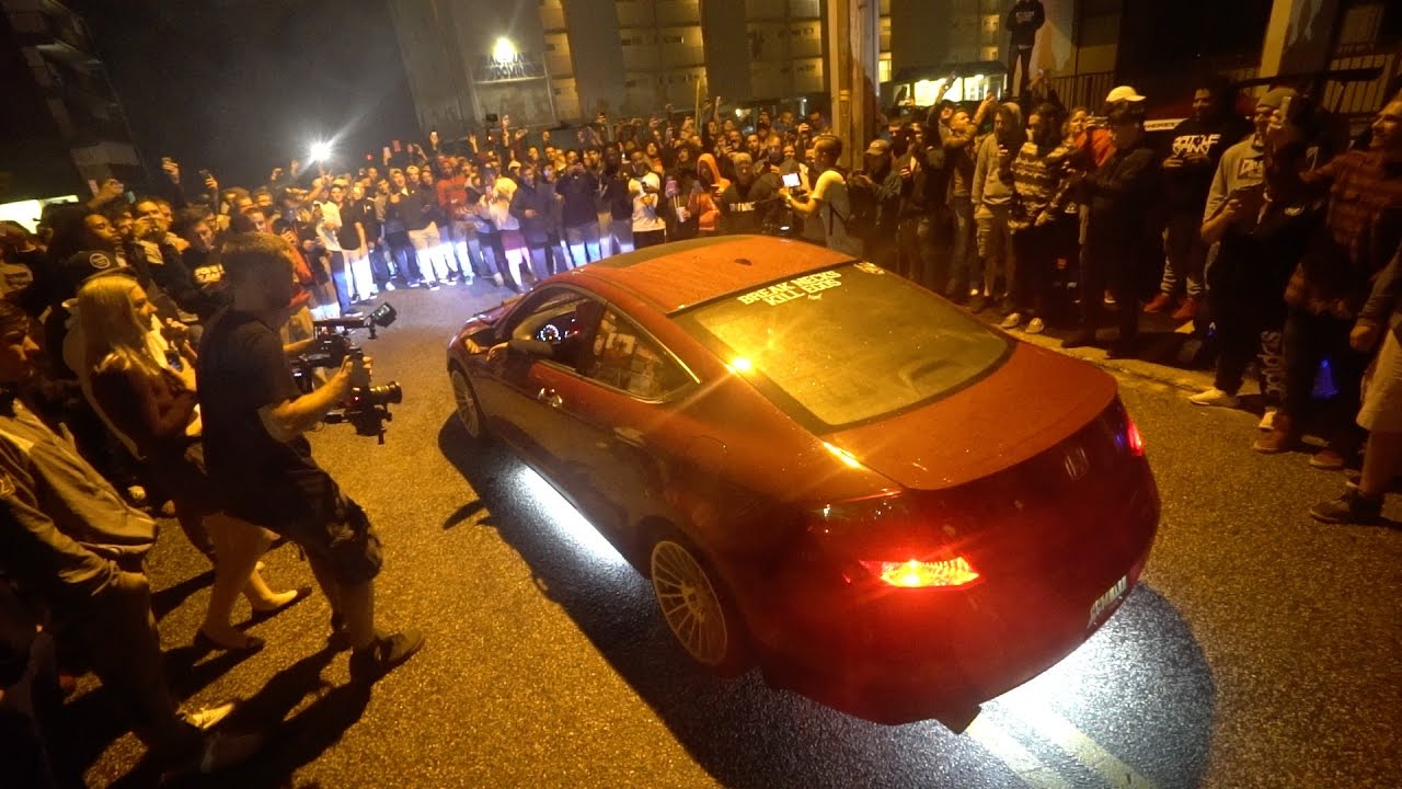 tj hunt shift knob HUMAN WALL PROTECTS HONDA FROM COPS!