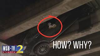 MAN DANGLING AS CAR IS WEDGED IN I-20 OVERPASS