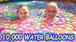 Filling Our Pool With 10,000 Water Balloons!!!
