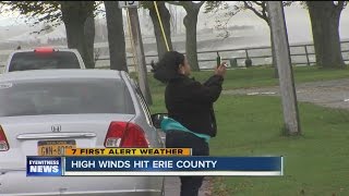 Residents brave wild weather to see large waves along lake shore