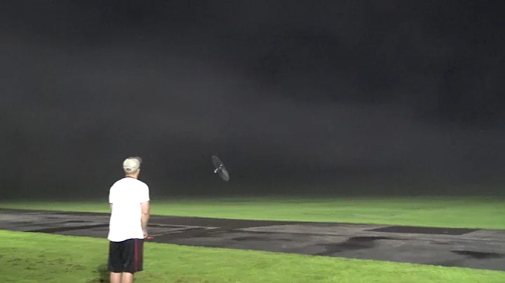 Michael Woodall flying as the fog rolls in at the ...