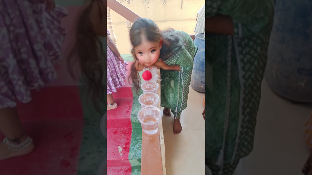 Blow the Ball over Water Glass Challenge 