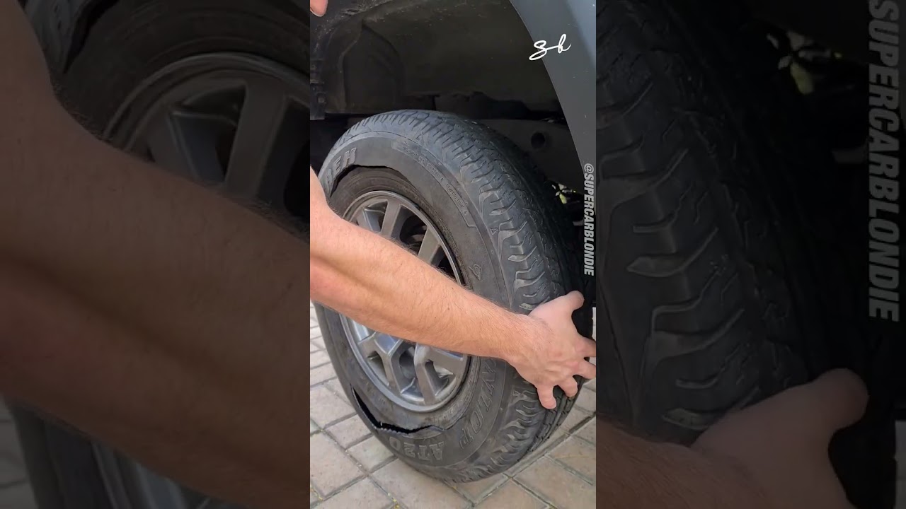 Changing a tire with over 100 rolls of duct tape 