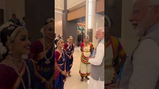 PM Narendra Modi watches a cultural performance by the members of the Indian Diaspora in Dubai.