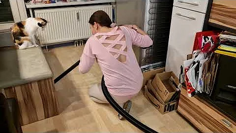 Vacuuming without a bra and in pantyhose