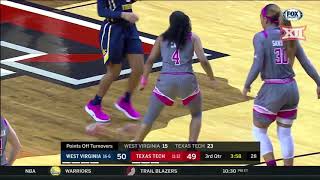 West virginia defeats texas tech 72 - 75.