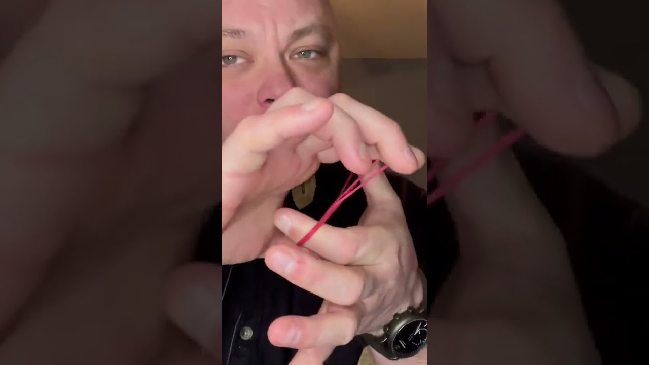 Simple magic trick-Crazy man’s Handcuffs