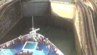 The Cruise Ship Approaches the Lock Gates and the Locomotives Move to the Next Higher Level