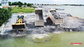 Remarkable cooperation between a dumper truck and a wheel loader to convey stones to deep lake!