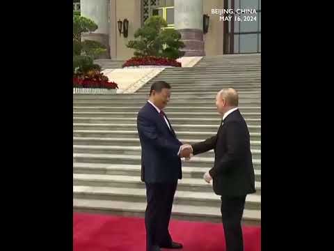 Chinese President Xi Jinping welcomes Putin in Beijing, rolling out red carpet