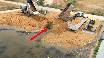 New Action Starting new project Building​​, Dozer Shantui push soil Filling up with truck DONGFENG