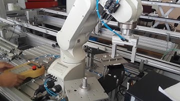 PROGRAMACIÓN DE TRASLADO DE UNA PIEZA CON EL ROBOT MITSUBISHI RV-1A/2AJ