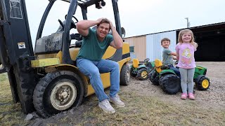 Using kids tractors to save stuck forklift in the mud | Tractors for kids