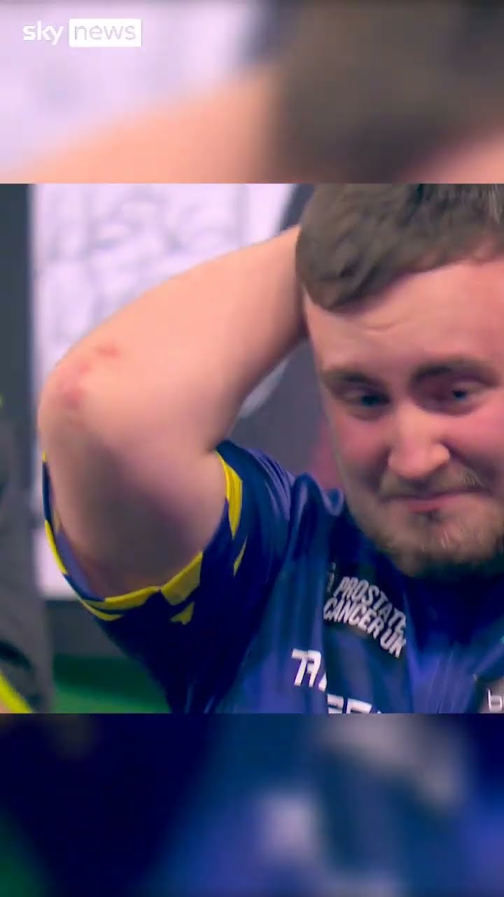 Luke Littler celebrates after winning final