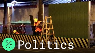 Chinese Workers Erect Wall Outside U.S. Consulate in Chengdu