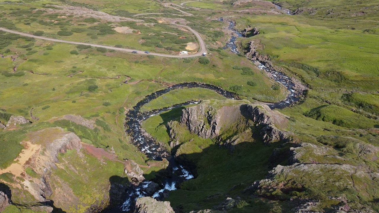 Drone flight at Klifbrekkufossar in Mjóifjörður, Iceland — Mjoifjordur, Iceland — video poster