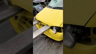 I smash cars with a forklift.