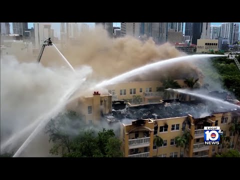 Worker found shot after Miami apartment building goes up in flames ...