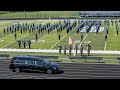Illinois high school band plays fight song one last time in honor of booster who died
