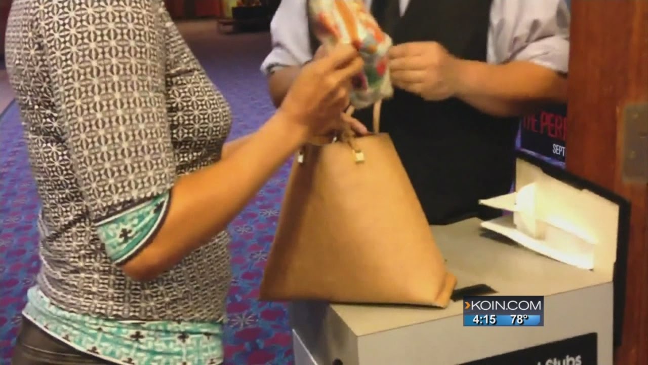 Regal starts bag checks after theater shootings - YouTube