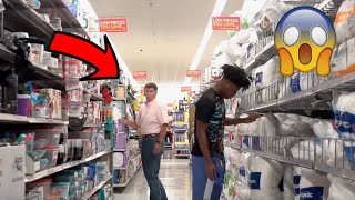 THROWING RICE ON RANDOM PEOPLE IN WALMART! (THREW RICE ON A WORKER!)