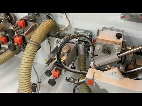 Adjusting top bottom trimmers on edgebander